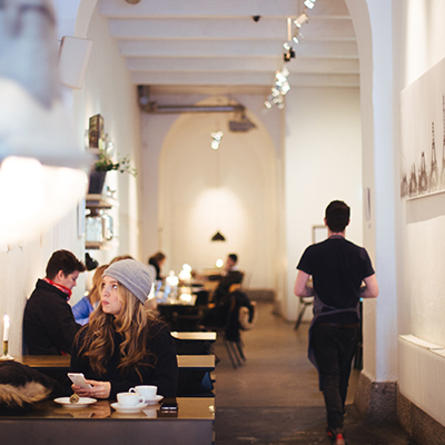 many people in a cafe