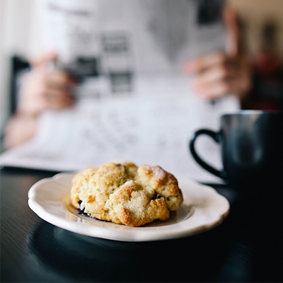 a biscuit with a coffee